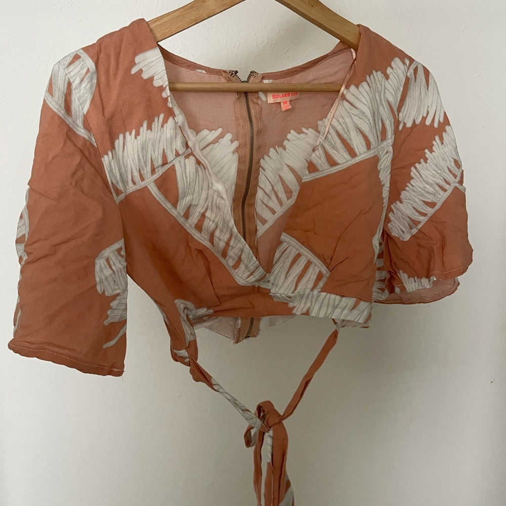 Cropped blouse with straps to tie around